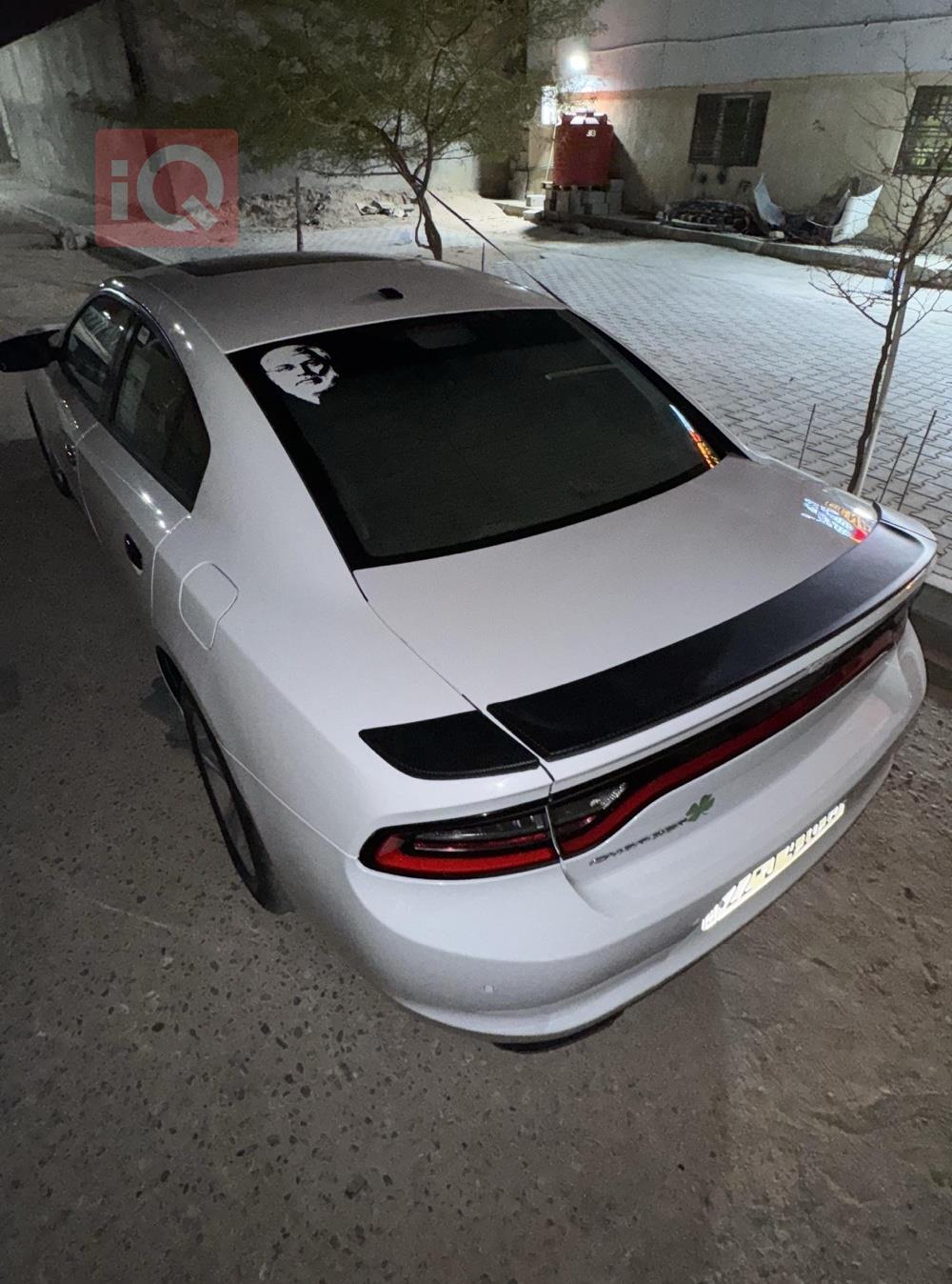 دۆج چارجەر